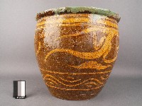 藏品(黃褐釉刻花龍紋缸)的圖片
