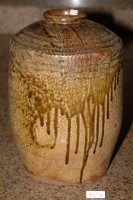 藏品(虎皮狀棕褐釉留釉拍打印紋窄口直壁式陶甕)的圖片