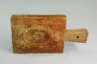藏品(長方形四面雕龜桃連錢魚紋帶柄粿印)的圖片