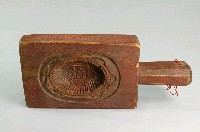 藏品(長方形四面雕龜桃連錢魚紋帶柄粿印)的圖片