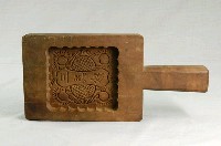 藏品(長方板單面雕方形花紋帶柄糕印)的圖片