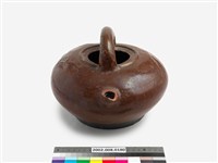 藏品(醬釉龍紋提粱壺)的圖片