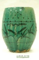 藏品(蟲草金錢紋綠釉鼓凳)的圖片