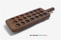 藏品(長方形單面雕二十一圓方花帶柄糕印)的圖片