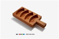 藏品(長方形單面雕四元寶彎錠帶柄糕印)的圖片