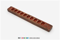 藏品(長條板單面雕十枚橢圓花文字紋糕印)的圖片