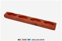 藏品(朱漆長條板單面雕四元寶彎錠糕印)的圖片