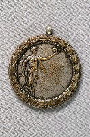 藏品(第16屆全臺灣陸上競技選手權大會紀念章)的圖片