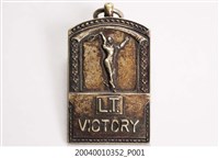 藏品(臺灣體育協會臺北支部庭球部昭和10年度A組秋季爭霸戰紀念徽章)的圖片