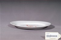 藏品(印繪紅釉雙魚紋橢圓盤)的圖片