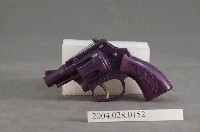 藏品(紫色玩具左輪手槍)的圖片