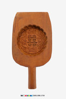 藏品(酒瓶形單面雕龍鳳囍字紋帶柄餅印)的圖片