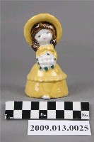 藏品(黃彩女孩陶瓷鈴鐺)的圖片