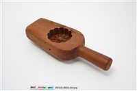 藏品(酒瓶形單面雕花瓣紋帶柄餅印)的圖片