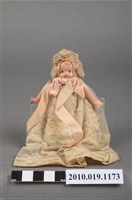 藏品(金色捲髮嬰兒玩偶)的圖片