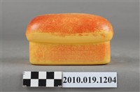 藏品(臺灣世界展望會愛的麵包存錢筒)的圖片