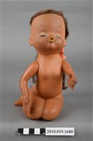 藏品(咖啡色嘟嘴女孩玩偶)的圖片