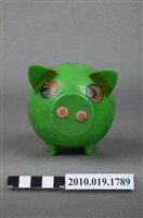 藏品(綠色豬造型存錢筒)的圖片