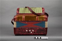 藏品(深紅色手風琴造型玩具)的圖片