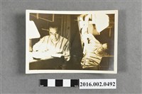 藏品(一位男士書桌閱讀照)的圖片