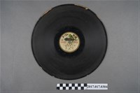 藏品(金鳥印公司發行臺語專輯《十二月花胎》紙板蟲膠唱片)的圖片