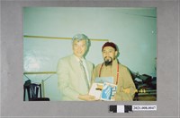 藏品(釋心道贈書給盧修一合照)的圖片