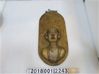 藏品(木雕紋面原住民人像掛飾)的圖片