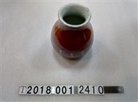 藏品(陶製橘色臺灣永生花瓶)的圖片