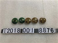 藏品(圓形綠色與黃色賽璐璐鈕扣)的圖片
