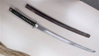 藏品(日本武士刀及布袋)的圖片