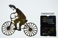 藏品(皮影戲全身偶-警官騎單車)的圖片