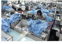 藏品(勞動影像暨說故事徵集比賽《成堆的成衣》戴瑞卿攝)的圖片