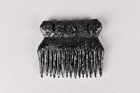 藏品(人面紋木梳)的圖片