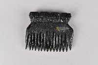 藏品(人頭木製梳)的圖片