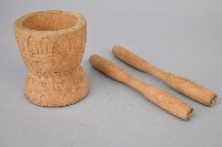 藏品(浮雕人面木製杵臼組)的圖片