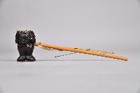 藏品(浮雕四面人像菸斗)的圖片