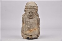 藏品(成人背孩童像石雕)的圖片