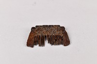 藏品(人面百步蛇紋木梳)的圖片