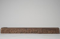 藏品(浮雕人面木製雙人枕)的圖片