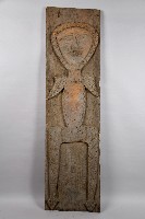 藏品(浮雕微笑人像木板)的圖片