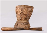 藏品(浮雕人像及幾何杵臼)的圖片