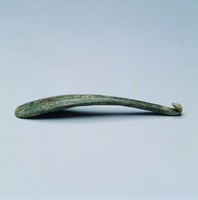 藏品(錯銀捲雲紋螭龍帶鉤)的圖片