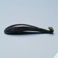 藏品(錯銀捲雲紋螭龍帶鉤)的圖片