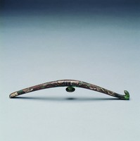 藏品(錯銀捲雲紋螭龍帶鉤)的圖片