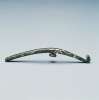 藏品(錯銀捲雲紋螭龍帶鉤)的圖片