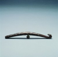 藏品(錯銀捲雲紋螭龍帶鉤)的圖片