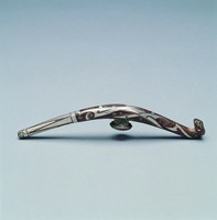 藏品(錯銀捲雲紋螭龍帶鉤)的圖片