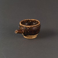 藏品(長沙窯黑釉盃式油燈)的圖片