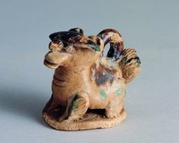 藏品(長沙窯青釉綠褐彩小狗)的圖片