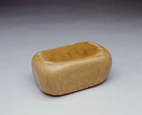 藏品(黃釉肱枕)的圖片